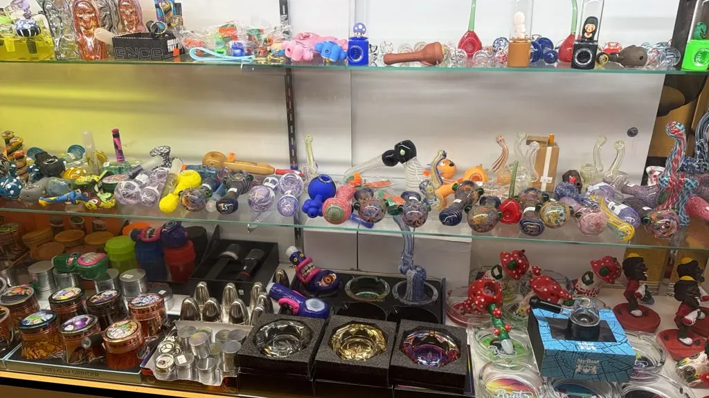 Colorful glass pipes in the display case