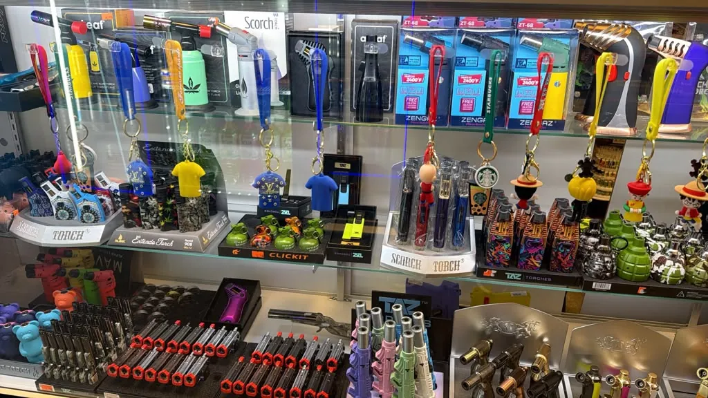 Torches, lighters, and accessories in the display case