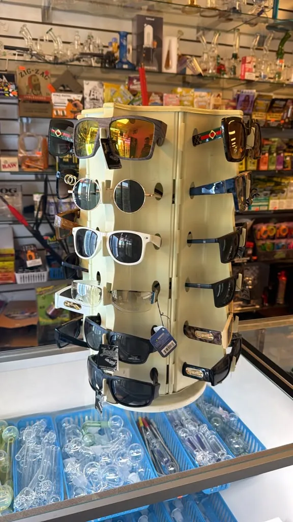 A rotating rack of sunglasses
